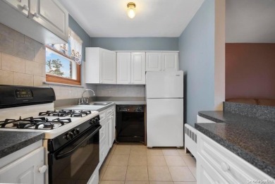 Welcome to this bright, first-floor corner unit in Trousdell on Glen Head Country Club in New York - for sale on GolfHomes.com, golf home, golf lot