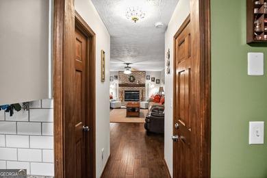 Welcome to this beautifully maintained Colonial-style brick home on West Pines Golf Club in Georgia - for sale on GolfHomes.com, golf home, golf lot