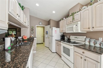 MOVE IN READY - PREMIER LOCATION - END UNIT - FURNISHED on Heritage Pines Country Club in Florida - for sale on GolfHomes.com, golf home, golf lot