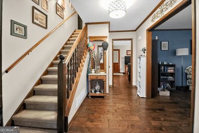 Welcome to this beautifully maintained Colonial-style brick home on West Pines Golf Club in Georgia - for sale on GolfHomes.com, golf home, golf lot