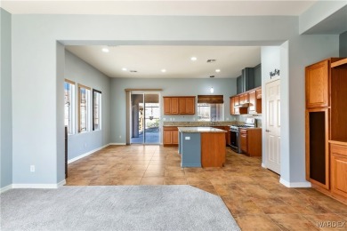 Welcome to the good life at Laughlin Ranch! Tucked at the end of on Laughlin Ranch Golf Club in Arizona - for sale on GolfHomes.com, golf home, golf lot