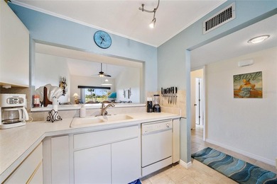 Condo Retreat Near the Gulf -Turnkey & Totally Charming. Ready on Capri Isle Golf Club in Florida - for sale on GolfHomes.com, golf home, golf lot