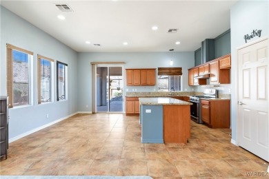 Welcome to the good life at Laughlin Ranch! Tucked at the end of on Laughlin Ranch Golf Club in Arizona - for sale on GolfHomes.com, golf home, golf lot