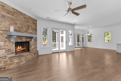 Welcome to this beautifully updated home with stunning views of on Reynolds Lake Oconee - The Landing in Georgia - for sale on GolfHomes.com, golf home, golf lot