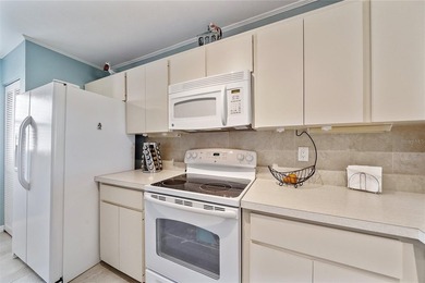 Condo Retreat Near the Gulf -Turnkey & Totally Charming. Ready on Capri Isle Golf Club in Florida - for sale on GolfHomes.com, golf home, golf lot