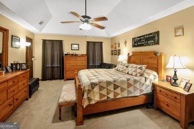 Welcome to this beautifully maintained Colonial-style brick home on West Pines Golf Club in Georgia - for sale on GolfHomes.com, golf home, golf lot