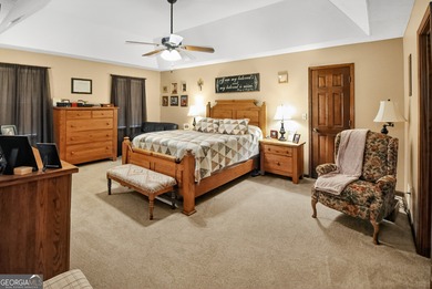 Welcome to this beautifully maintained Colonial-style brick home on West Pines Golf Club in Georgia - for sale on GolfHomes.com, golf home, golf lot