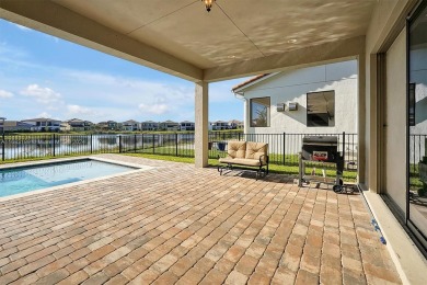 This beautiful home is located in the highly sought-after Lake on Eagle Creek Golf Club in Florida - for sale on GolfHomes.com, golf home, golf lot