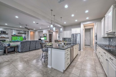 Enjoy breathtaking golf course views and unforgettable Arizona on Copper Canyon Golf Club in Arizona - for sale on GolfHomes.com, golf home, golf lot