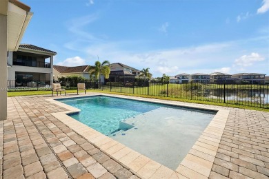 This beautiful home is located in the highly sought-after Lake on Eagle Creek Golf Club in Florida - for sale on GolfHomes.com, golf home, golf lot