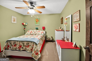 Welcome to this beautifully maintained Colonial-style brick home on West Pines Golf Club in Georgia - for sale on GolfHomes.com, golf home, golf lot