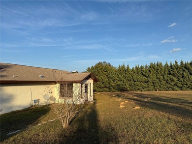 Discover incredible value in this concrete block stucco on Citrus Hills Golf Club in Florida - for sale on GolfHomes.com, golf home, golf lot