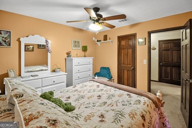 Welcome to this beautifully maintained Colonial-style brick home on West Pines Golf Club in Georgia - for sale on GolfHomes.com, golf home, golf lot