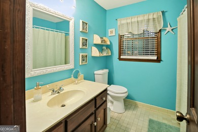 Welcome to this beautifully maintained Colonial-style brick home on West Pines Golf Club in Georgia - for sale on GolfHomes.com, golf home, golf lot