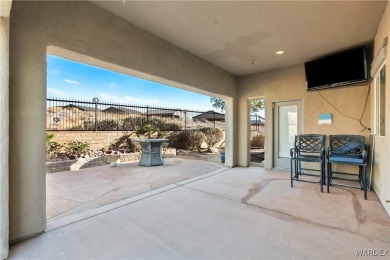 Welcome to the good life at Laughlin Ranch! Tucked at the end of on Laughlin Ranch Golf Club in Arizona - for sale on GolfHomes.com, golf home, golf lot