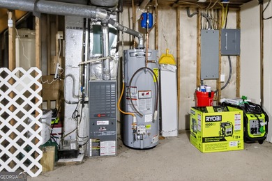 Welcome to this beautifully maintained Colonial-style brick home on West Pines Golf Club in Georgia - for sale on GolfHomes.com, golf home, golf lot