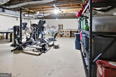 Welcome to this beautifully maintained Colonial-style brick home on West Pines Golf Club in Georgia - for sale on GolfHomes.com, golf home, golf lot