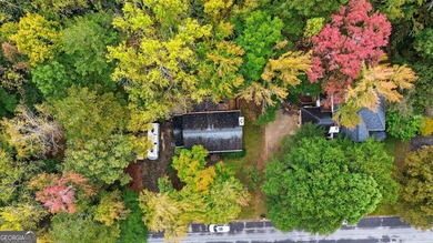 Welcome to this beautifully maintained Colonial-style brick home on West Pines Golf Club in Georgia - for sale on GolfHomes.com, golf home, golf lot
