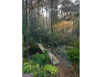 Welcome to this beautifully maintained Colonial-style brick home on West Pines Golf Club in Georgia - for sale on GolfHomes.com, golf home, golf lot