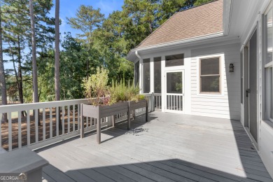 Welcome to this beautifully updated home with stunning views of on Reynolds Lake Oconee - The Landing in Georgia - for sale on GolfHomes.com, golf home, golf lot