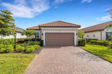 This property is a must-see! This golf-deeded home features on Esplanade Golf and Country at Lakewood Ranch in Florida - for sale on GolfHomes.com, golf home, golf lot