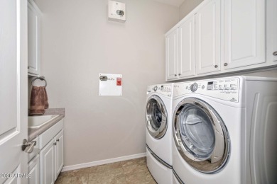 Enjoy breathtaking golf course views and unforgettable Arizona on Copper Canyon Golf Club in Arizona - for sale on GolfHomes.com, golf home, golf lot