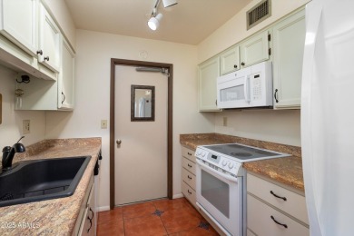 This desirable end unit garden apartment has 1221 sq. ft. of on Hillcrest Golf Club in Arizona - for sale on GolfHomes.com, golf home, golf lot