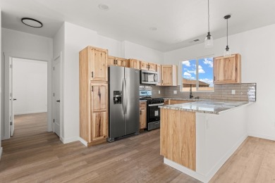 Welcome to 133 Chamartin, a stunning custom home ideally located on Tierra Del Sol Golf Course in New Mexico - for sale on GolfHomes.com, golf home, golf lot