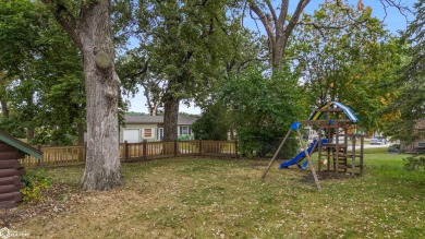 This charming cabin-style family home has been completely redone on All Vets Golf Club in Iowa - for sale on GolfHomes.com, golf home, golf lot