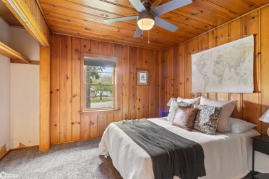 This charming cabin-style family home has been completely redone on All Vets Golf Club in Iowa - for sale on GolfHomes.com, golf home, golf lot
