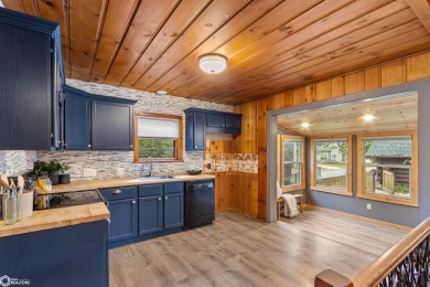 This charming cabin-style family home has been completely redone on All Vets Golf Club in Iowa - for sale on GolfHomes.com, golf home, golf lot