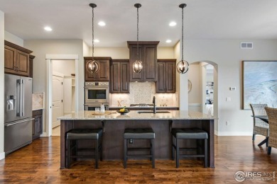 Elegant Golf Course Living at 6297 Crooked Stick Drive, Windsor on Highland Meadows Golf Course in Colorado - for sale on GolfHomes.com, golf home, golf lot