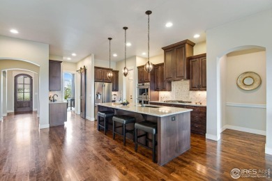 Elegant Golf Course Living at 6297 Crooked Stick Drive, Windsor on Highland Meadows Golf Course in Colorado - for sale on GolfHomes.com, golf home, golf lot
