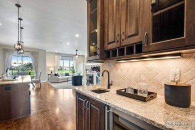 Elegant Golf Course Living at 6297 Crooked Stick Drive, Windsor on Highland Meadows Golf Course in Colorado - for sale on GolfHomes.com, golf home, golf lot