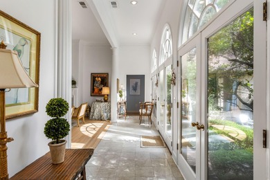 Classic and elegantly designed home with French provincial style on The Seabrook Island Club in South Carolina - for sale on GolfHomes.com, golf home, golf lot