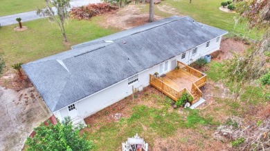 This charming home is nestled on the edge of Ocean Pond on Francis Lake Golf Club in Georgia - for sale on GolfHomes.com, golf home, golf lot