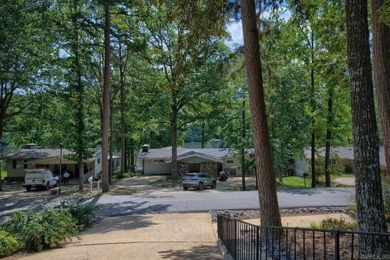 Love lake life? This freshly painted and transformed home is on DeSoto Golf Course in Arkansas - for sale on GolfHomes.com, golf home, golf lot