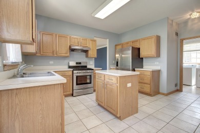 This description highlights a spacious Carmel model home on The Links at Carillon in Illinois - for sale on GolfHomes.com, golf home, golf lot