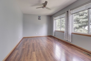 This description highlights a spacious Carmel model home on The Links at Carillon in Illinois - for sale on GolfHomes.com, golf home, golf lot