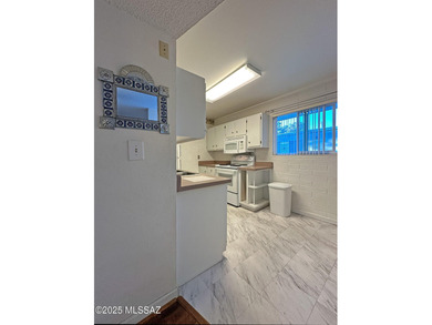 Reduced Price! Beautifully updated 2-bedroom, 1-bath upstairs on Randolph Park Golf Courses in Arizona - for sale on GolfHomes.com, golf home, golf lot