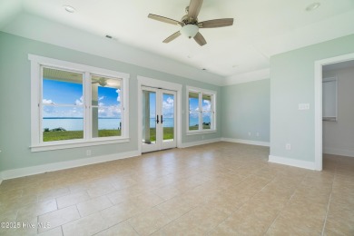 Riverfront Retreat with Five-Mile Neuse Views. Wake up to on Minnesott Golf and Country Club in North Carolina - for sale on GolfHomes.com, golf home, golf lot