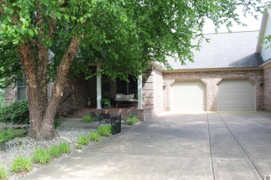 This beautifully crafted custom brick duplex is full of charm on Rolling Hills Country Club in Kentucky - for sale on GolfHomes.com, golf home, golf lot