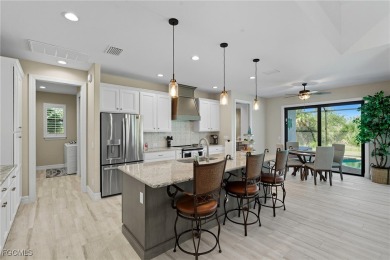 Built in 2023, this immaculate home offers soaring 14-ft on Rotonda Golf and Country Club - Long Marsh  in Florida - for sale on GolfHomes.com, golf home, golf lot