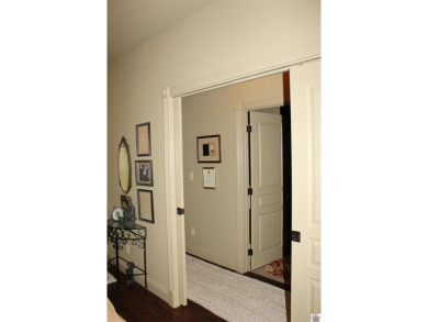 This beautifully crafted custom brick duplex is full of charm on Rolling Hills Country Club in Kentucky - for sale on GolfHomes.com, golf home, golf lot