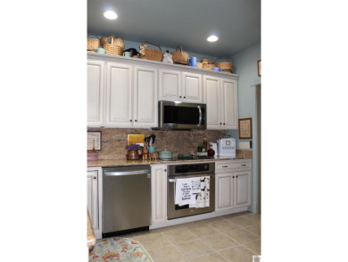 This beautifully crafted custom brick duplex is full of charm on Rolling Hills Country Club in Kentucky - for sale on GolfHomes.com, golf home, golf lot