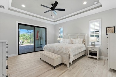 Built in 2023, this immaculate home offers soaring 14-ft on Rotonda Golf and Country Club - Long Marsh  in Florida - for sale on GolfHomes.com, golf home, golf lot