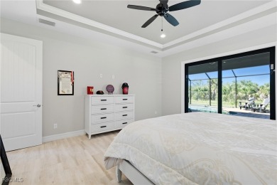 Built in 2023, this immaculate home offers soaring 14-ft on Rotonda Golf and Country Club - Long Marsh  in Florida - for sale on GolfHomes.com, golf home, golf lot