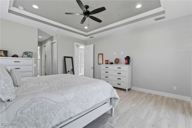 Built in 2023, this immaculate home offers soaring 14-ft on Rotonda Golf and Country Club - Long Marsh  in Florida - for sale on GolfHomes.com, golf home, golf lot