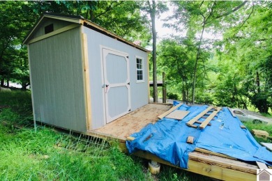 Discover an exceptional opportunity to build your dream home on Mineral Mound Golf Course in Kentucky - for sale on GolfHomes.com, golf home, golf lot