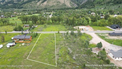 Great, ready-to-build lot offering expansive mountain views and on Cedar Creek Golf Course in Wyoming - for sale on GolfHomes.com, golf home, golf lot